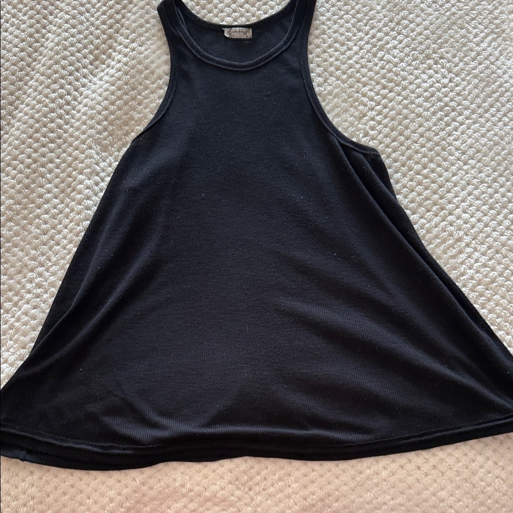 Free People black tank size medium. Relaxed fit.
